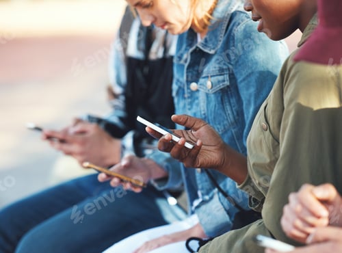 Preview: friends using smartphones group of students browsing social media messages on mobile phones in city