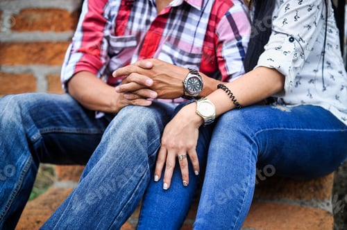 Preview: Closeup shot of a loving couple sitting close outdoors enjoying time together