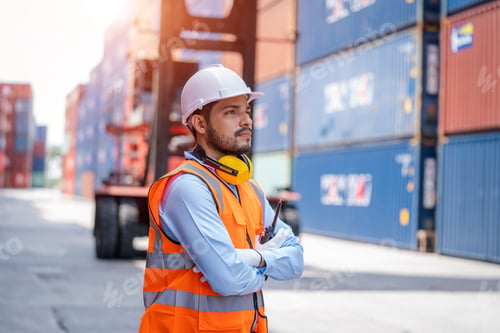 Preview: Engineer container cargo working and checking stock into container for loading.