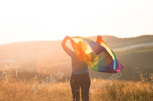 Preview: Young woman with LGBT flag.