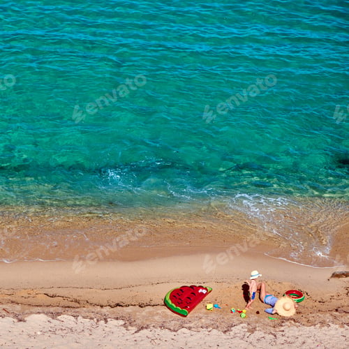 Preview: Two Year Old Toddler Boy And His Mother On Beach With Inflatable Float And Ring. Summer Family