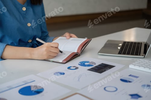 Preview: Bookkeeper or financial inspector hands making report taking note, calculating. Home finances