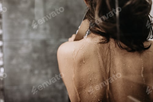 Preview: Adult woman, wanting to share her pain having a shower, sad atmosphere
