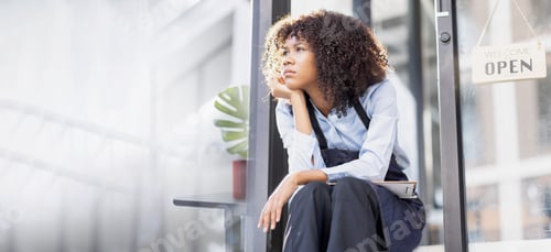 Preview: Portrait of Young african american small business owner woman wearing apron and looking away to you