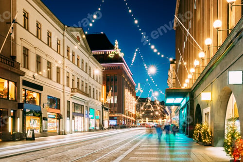 Preview: Helsinki, Finland. Night View Of Aleksanterinkatu Street With Railroad In Kluuvi District In Evening