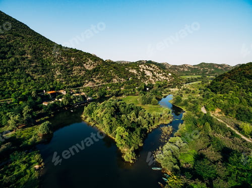 Preview: Aerial view of the Crnojevica river canyon surrounded by green mountains