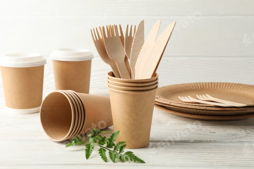 Preview: Eco - friendly tableware on wooden table, space for text