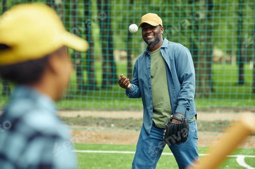 Preview: Father training his son with baseball