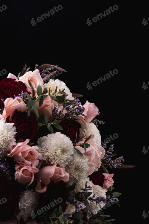 Preview: Vertical shot of a luxurious bouquet of pink roses and white, red dahlias on a black background