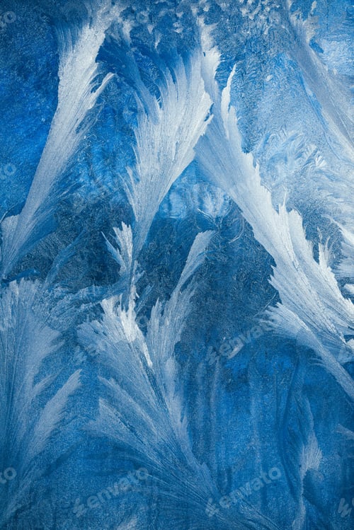 Preview: Contrast frosty pattern on the window, abstract winter background