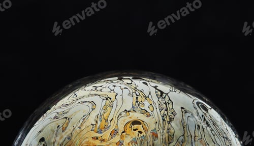 Preview: Abstract Sphere with Swirling Colors on Black Background