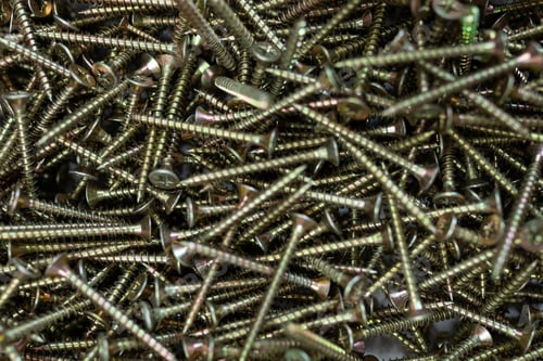 Preview: pile of screws close up, hardware store