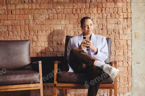 Preview: Portrait of multiracial LGBTQ mid adult woman using smartphone