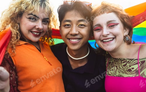Preview: Happy gay friends having fun together during pride festival