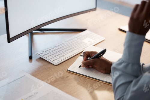 Preview: Writing ideas, planning business worker in an office with notebook and blank desktop computer monit