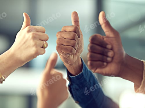 Preview: Heres to a job well done. Closeup shot of a group of businesspeople giving thumbs up together.