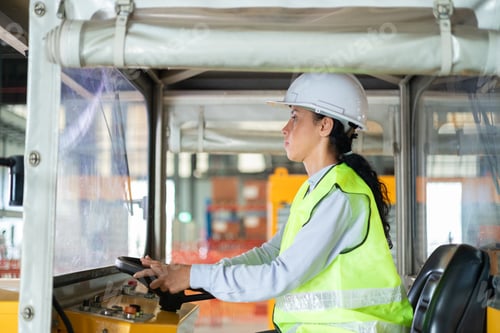 Preview: Warehouse Worker Operating Electric Tugger