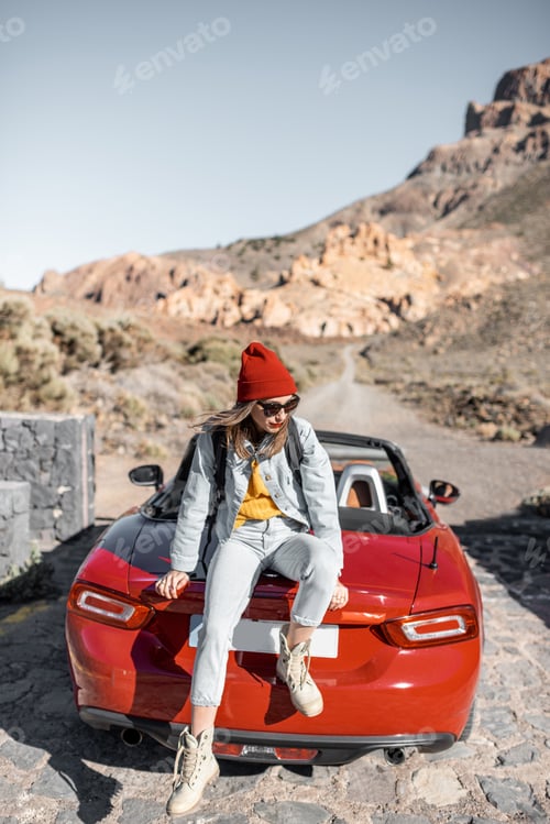 Preview: Woman traveling by car on the dessert valley