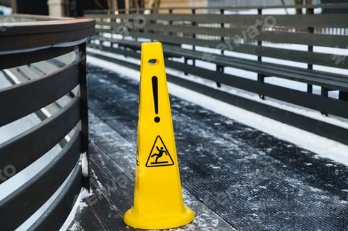Preview: Be aware of slippery road. Slippery yellow surface sign. Wet floor sign. Icing concept