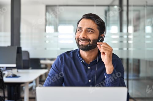 Preview: Professional Indian call center agent in headset working in customer support.