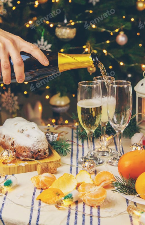 Preview: Champagne on the Christmas table. Selective focus.