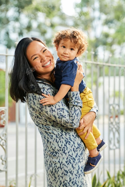 Preview: Mother Holding Little Son