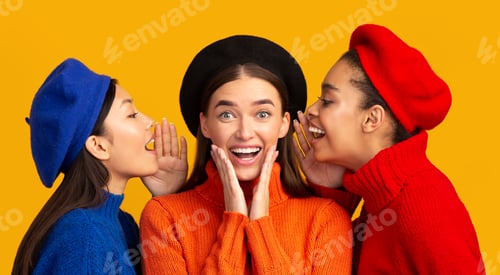 Preview: Multiethnic Girls Whispering Secrets To Excited Friend, Studio Shot, Panorama