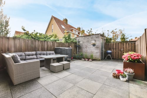 Delightful courtyard of the house with a soft sofa