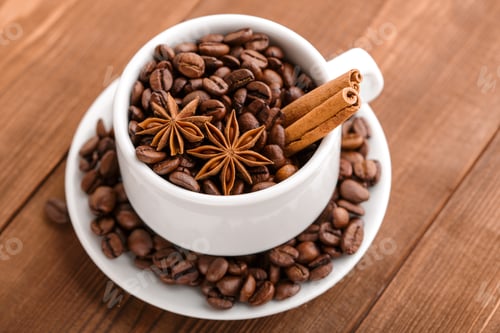 Preview: Coffee Beans And Cinnamon On A Background Of Burlap. Roasted Coffee Beans Background Close Up
