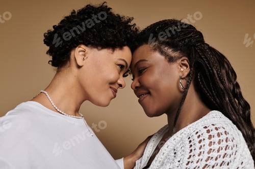Preview: Loving connection between stylish lesbian couple sharing a heartfelt moment together