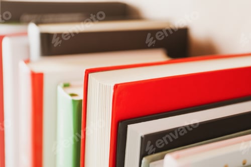 Preview: Many books on whole background, close up. Self development