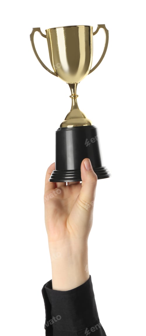 Preview: Woman with golden trophy cup on white background, closeup