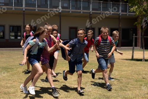 Preview: School children running in school playground