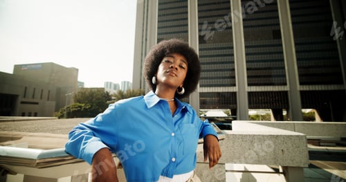 Preview: Portrait, fashion and black woman in city, confidence and travel with buildings, urban town or edgy