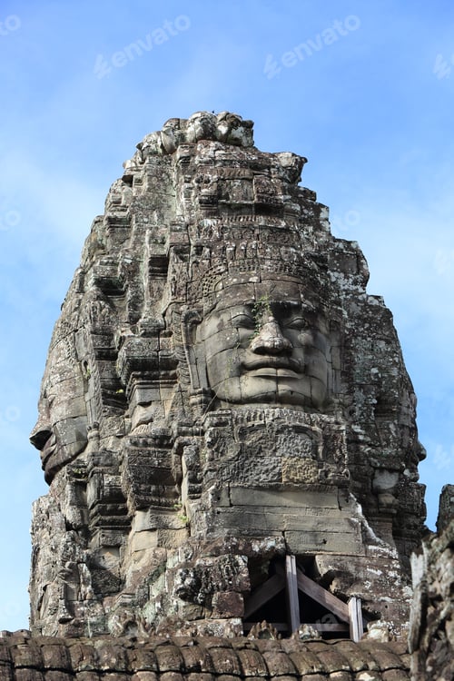 Preview: Antique statue standing majestically in the Angkor Wat temple complex in Cambodia