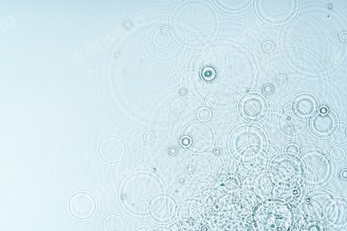 Preview: Gentle ripples form on a serene blue surface