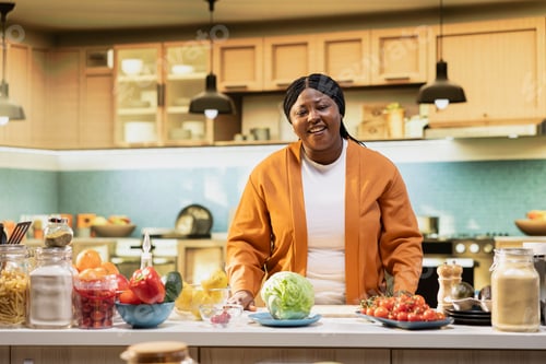 Preview: African American woman food vlogger filming homemade food recipe