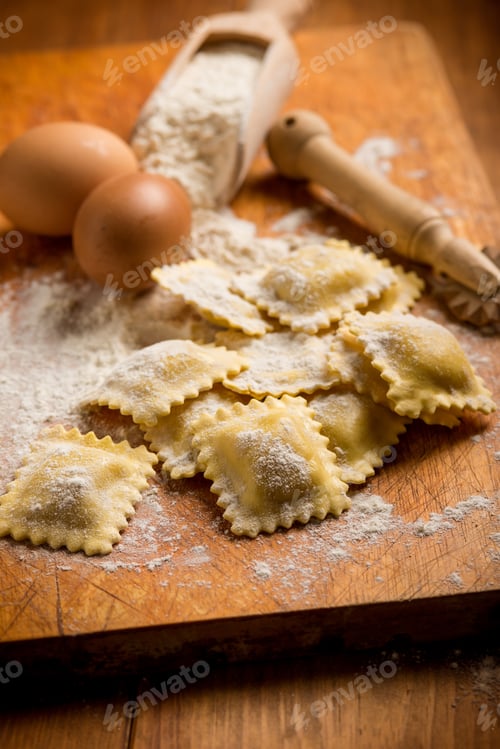Preview: italian ravioli with ingredient over cutting board