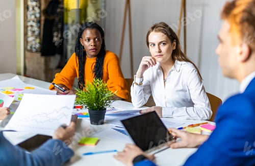 Preview: Business team working in a start-up office