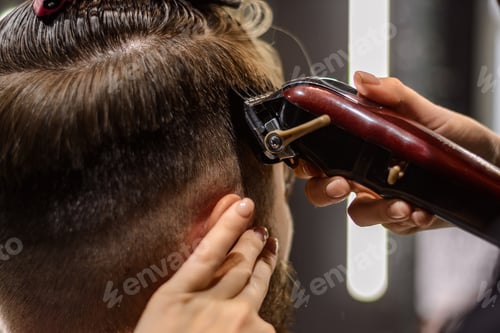 Preview: Hairdresser during work. Close-up, selective focus