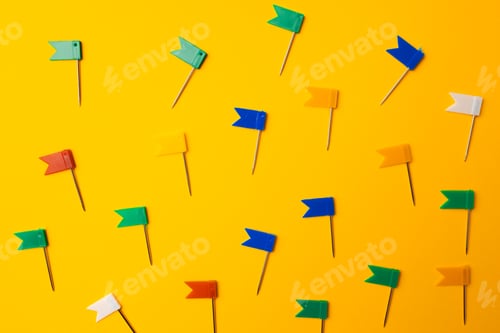 Preview: Color push pins pattern on yellow background