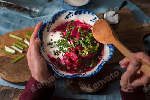 Preview: Eating borscht from ceramic plate horizontal