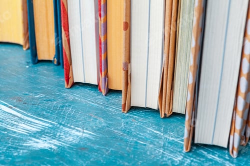 Preview: paperback books on a table. creative photo