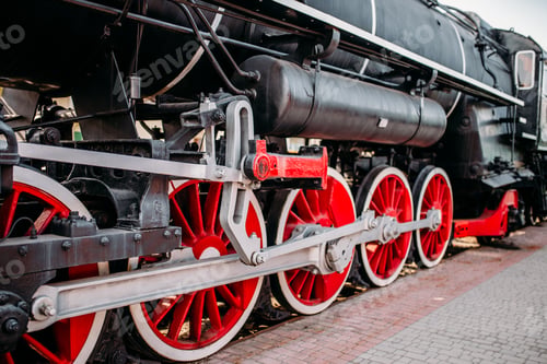 Preview: Old steam train, red wheels closeup