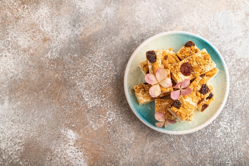 Preview: Traditional candy nougat with nuts and sesame, top view, copy space.