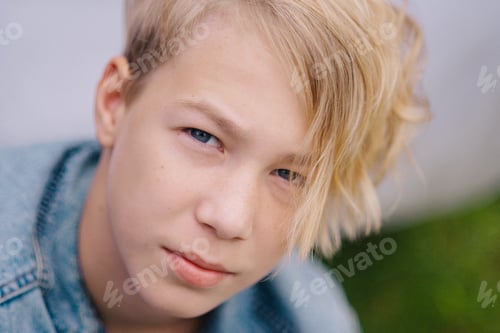 Preview: portrait of stylish blond boy looking at camera