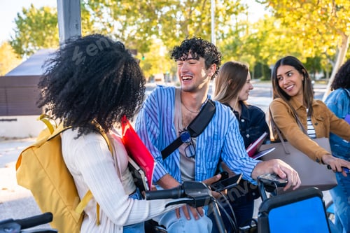 Preview: Diverse students talking and laughing on university campus