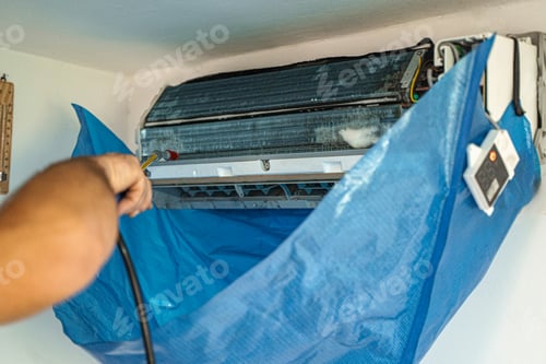 Preview: Air conditioning maintenance in a cozy indoor space