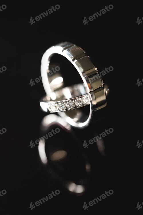 Preview: Two gold wedding rings close-up. Macro shooting
