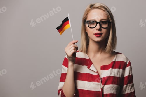 Preview: beatiful girl holds German flag